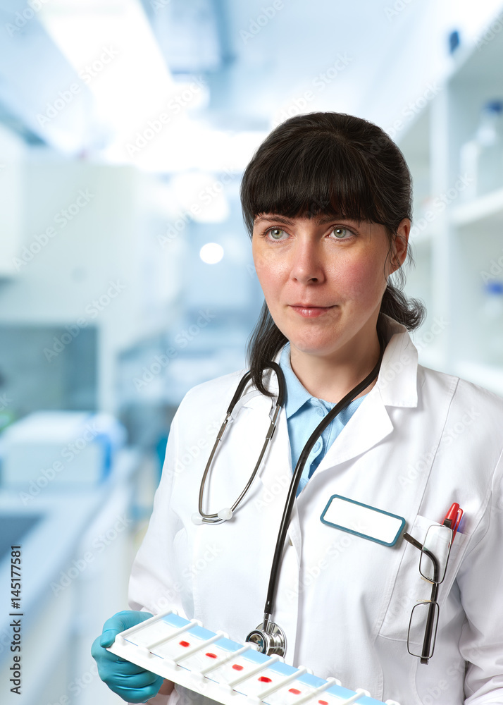 Female doctor, medtech or a medical scientist in white coat Female doctor, medtech or a medical scientist in white coat
