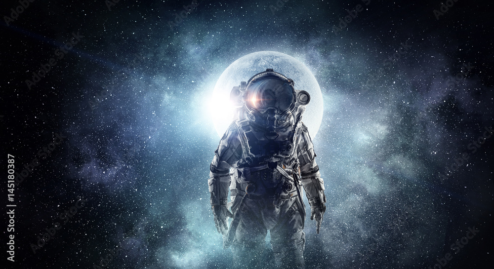 Astronaut in outer space. Mixed media . Mixed media - obrazy, fototapety, plakaty 