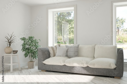 White room with sofa and green landscape in window. Scandinavian interior design. 3D illustration © AntonSh