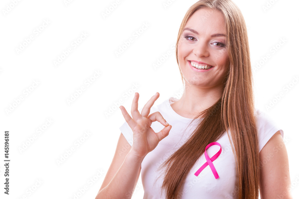 woman pink cancer ribbon on chest making ok sign woman pink cancer ribbon on chest making ok sign
