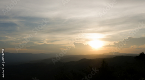Landscape mountain in sunset with cloud and golden light