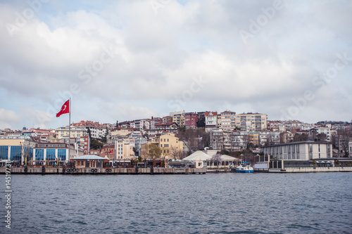 View of Istanbul and Bosphorus, Turkey. Sea front town houses © allenkayaa