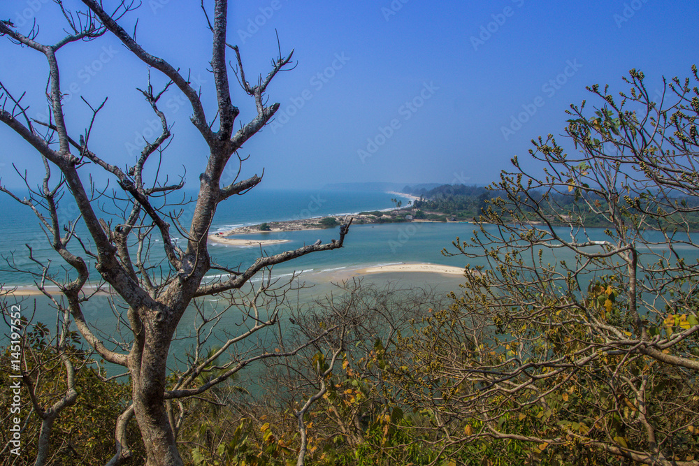 Shiroda beach in the state of Maharashtra, India. View from Redi fort