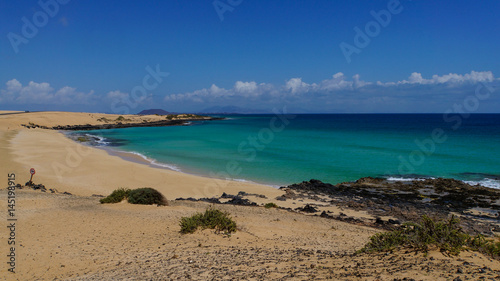 White sand beach with turquoise water of Corralejo on the island of Fuerteventura
