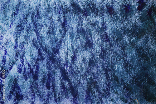 Blue paint on rough paper stains and stripes