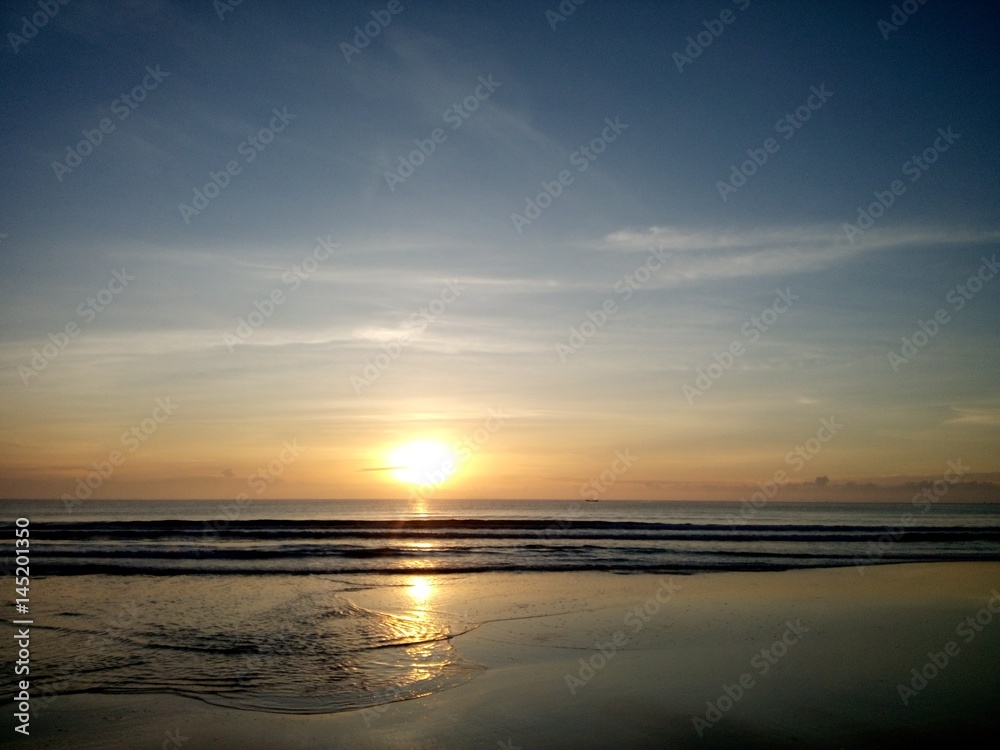 Fototapeta premium Watching the sunset At a seaside in the Gulf of Thailand.