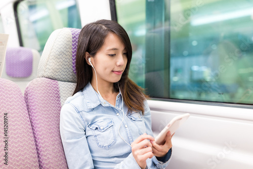 Woman listen to song inside train compartment Free Download Woman listen to song inside train compartment - GFXLoad