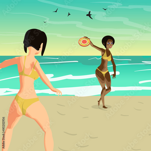 Two young women in a bikini throw a flying disk on the beach. Gi