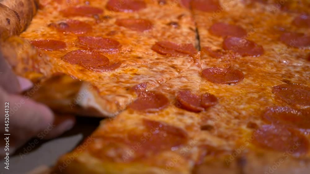 Slow Motion taking slice of pizza Slow Motion taking slice of pizza
