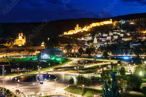 View of Rike Park Old city  Metekhi bridge and church and Narikala fortress at night. Tbilisi  Georgia