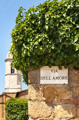 Fototapeta Naklejka Na Ścianę i Meble -  A sign on the wall in Pienza town. Italy