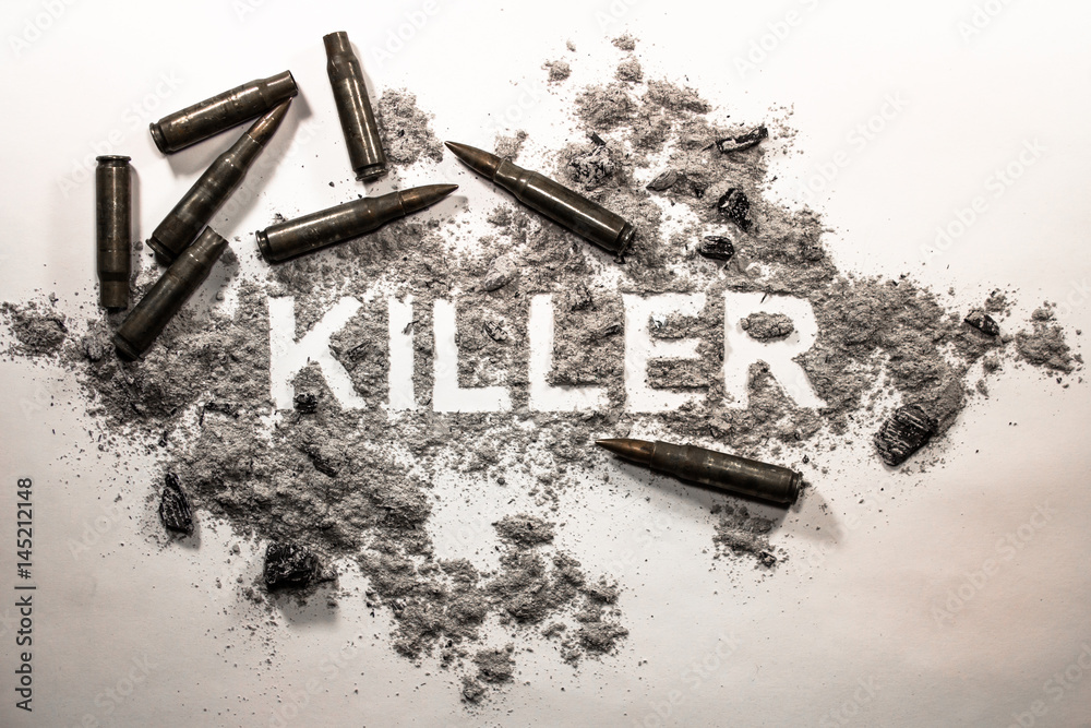 Fototapeta premium Killer text word written in grey ash, dirt, filth with bullets around as crime, criminal, murder, war, death, violence, weapon, gun concept background