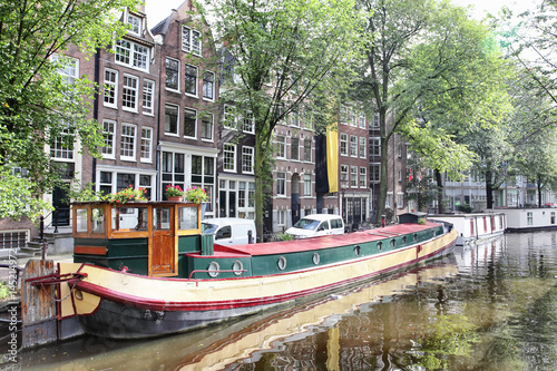 Amsterdam canal with boats