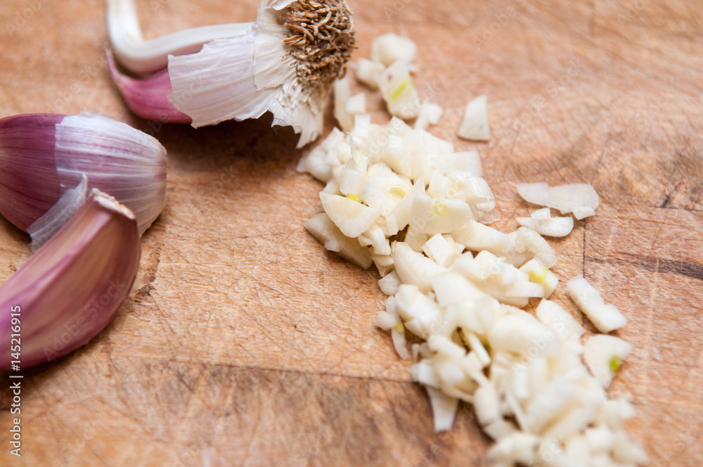 Fresh garlic food ingredient for a cookery background Fresh garlic food ingredient for a cookery background