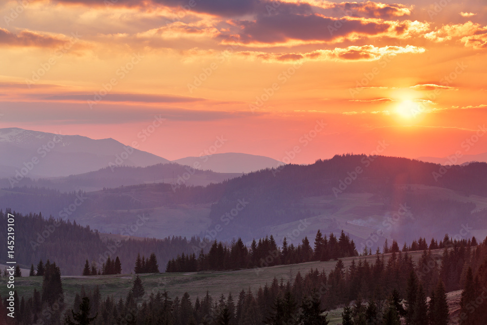 Majestic spring sunset in the mountains landscape