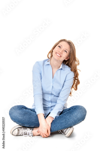 Young woman looking up