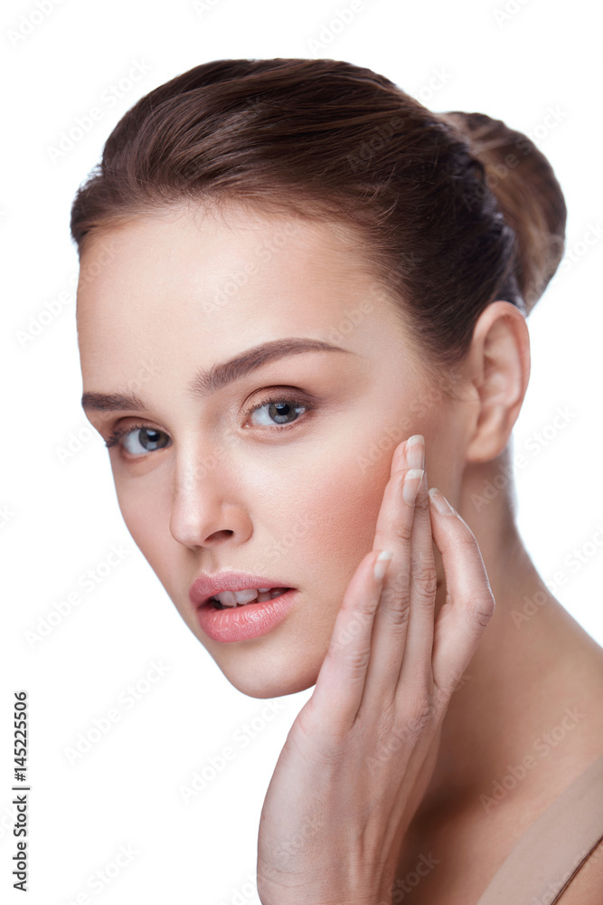 Woman With Face Makeup Touching Smooth Skin. Beauty Cosmetics