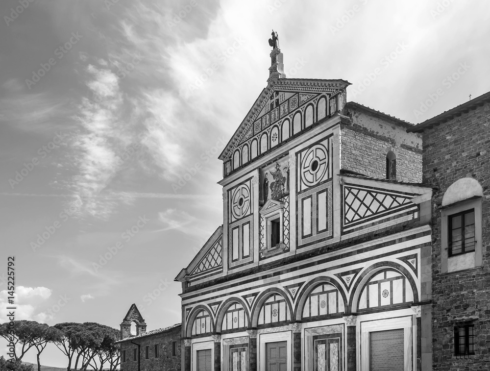 The splendid facade of the abbey basilica of San Miniato al Monte, on the hill overlooking the historic center of Florence, Italy, in black and white The splendid facade of the abbey basilica of San Miniato al Monte, on the hill overlooking the historic center of Florence, Italy, in black and white