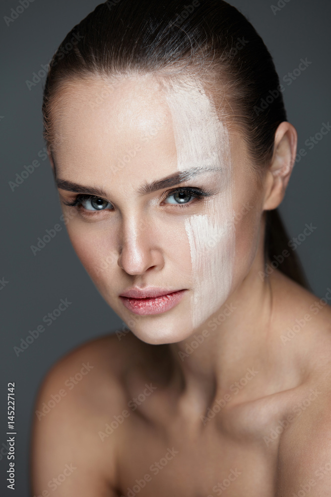 Facial Makeup. Sexy Woman With Cream Mask On Face Skin Facial Makeup. Sexy Woman With Cream Mask On Face Skin