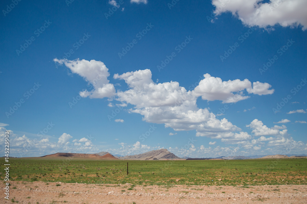 Scenic View of a Desert and Mountain Landscape after the Rain, near Solitaire, Namibia