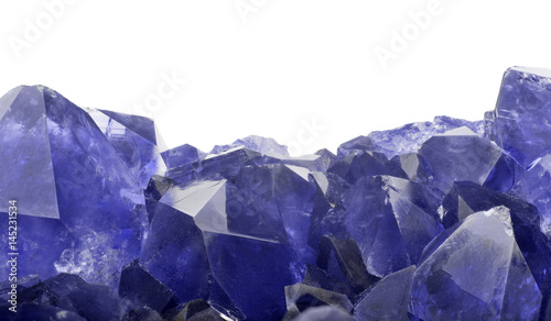 blue sapphire crystals closeup on white