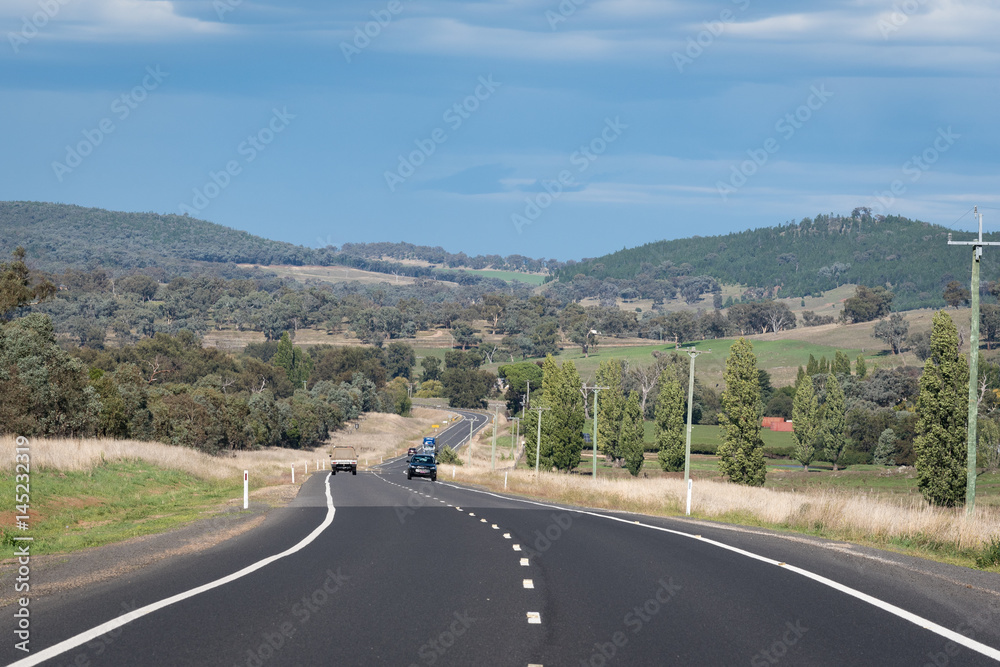 Fototapeta premium Beautiful road in autumn in the regional area of Australia.