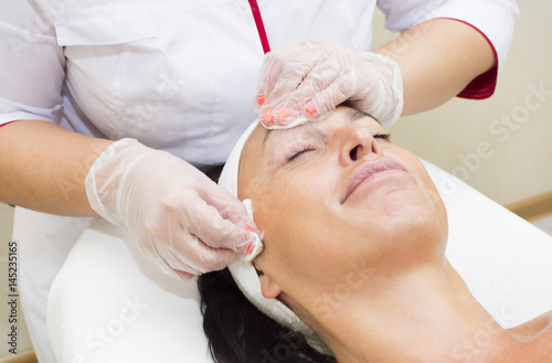 Process cosmetic mask of massage and facials in beauty salon  © lester120