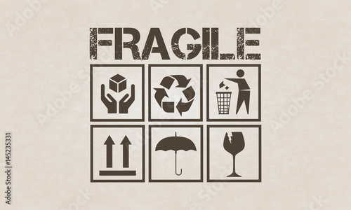 Fragile symbol set on brown cardboard