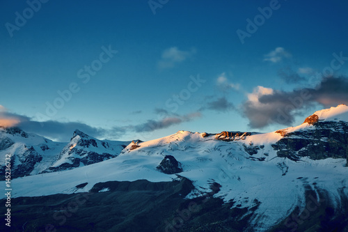 beautifull cloudy sunrise in the mountains with snow ridge. Alps. Switzerland, Trek near Matterhorn mount.