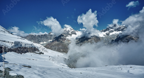 Amazing View of the mountain range near the Matterhorn in the Swiss Alps. Snow capped mountains. Trek near Matterhorn mount. © vitaliymateha