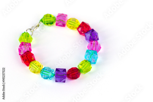Colorful kid bracelet isolated on white background