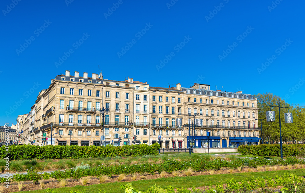 Buildings and garden on Quai Louis XVIII in the historic centre of Bordeaux, France