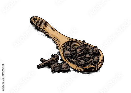Cloves on the wooden scoop