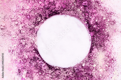 Pink and purple makeup powder forming frame for text