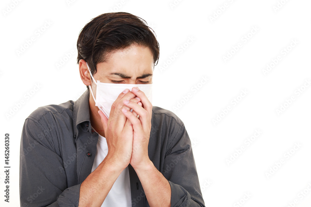 風邪に罹患した男性

