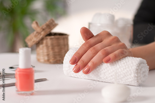  Hand care. Beautiful manicure  woman s hands in the spa