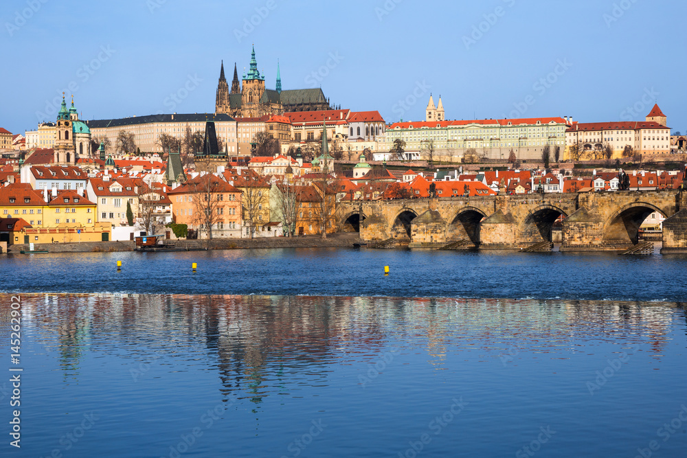 The Vltava river (Moldau) in Prague with Charles Bridge and St. Vitus Cathedral in the background
