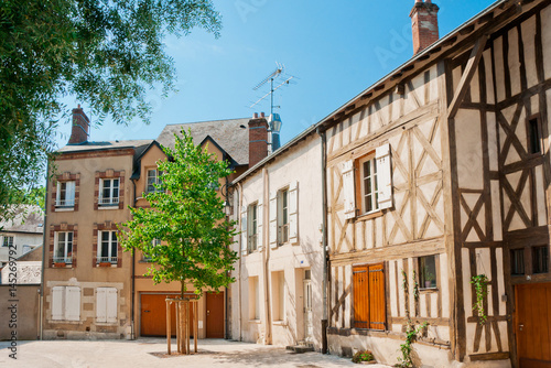 Street with typical houses in Orleans, France photo