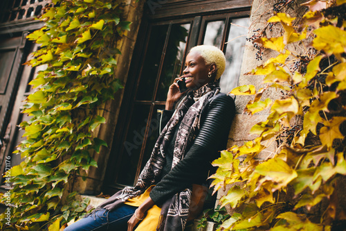 Pretty young black woman wi...