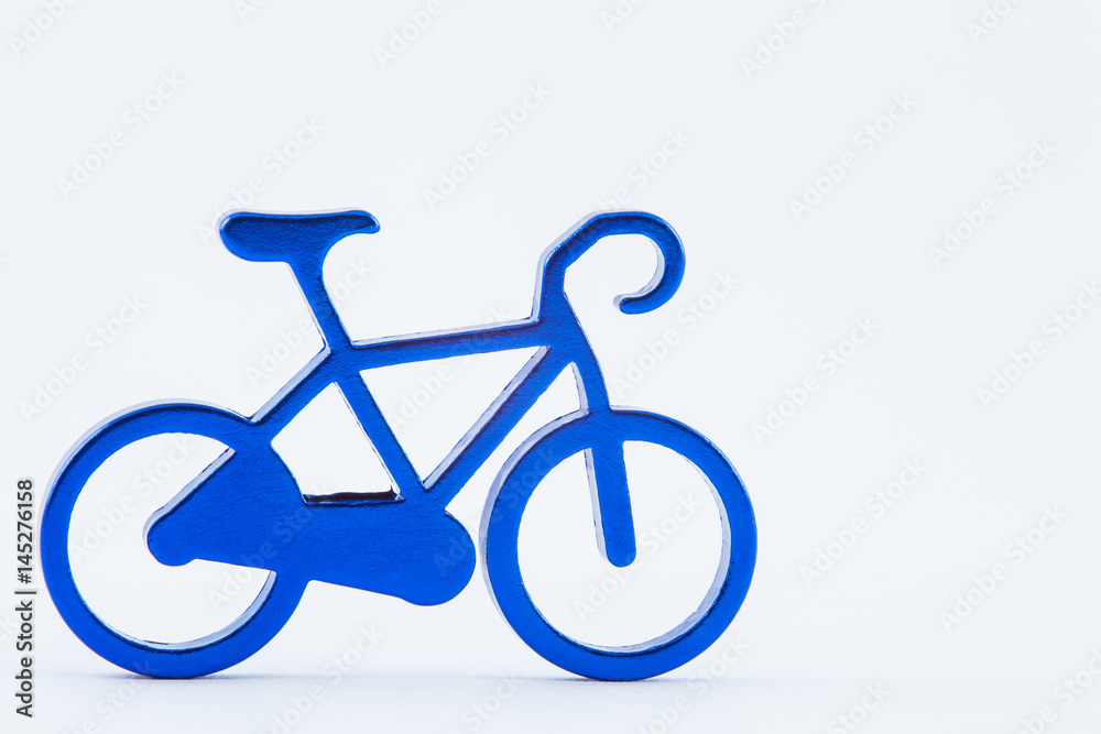 Fototapeta premium Blue toy bicycle isolated on white background