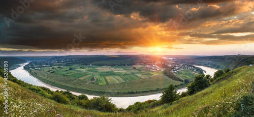 Panoramic view from the hill on  bend of the river at sunset. Dniester Canyon. Ukraine.   © vovik_mar