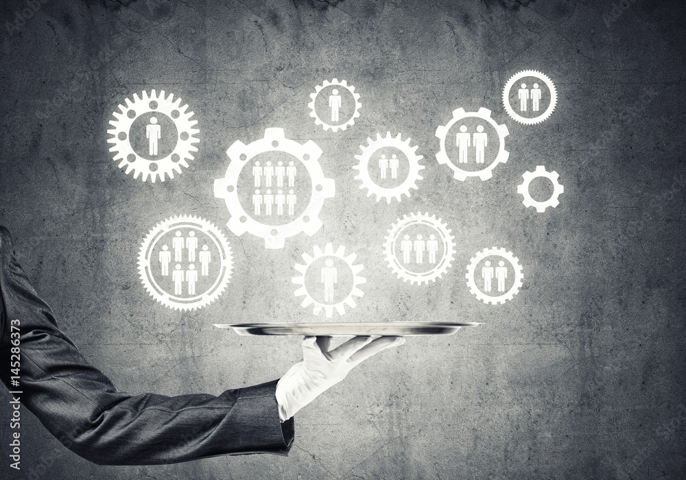 Waiter hand with white gloves holding silver plate full of social media communication icons Waiter hand with white gloves holding silver plate full of social media communication icons