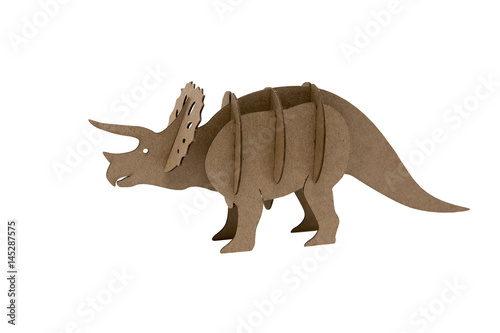 Triceratops made out of cardboard. paper dinosaur toy isolated on white background