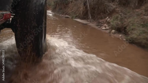 Wallpaper Mural Offroad Tire Driving Through Water Torontodigital.ca
