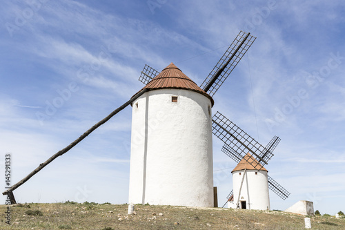 white windmills in Mota del Cuervo, Province of Cuenca, Castilla La Mancha, Spain