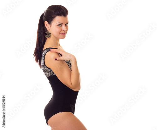 Young woman in swimming suit with earrings