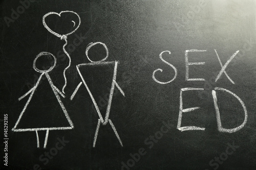 School blackboard with text SEX ED