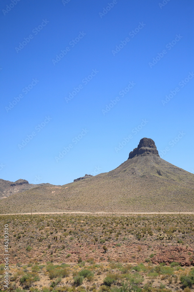 Mountain and Desert Landscape in Arizona, with blue sky and copy space.