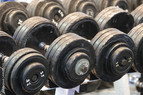 barbells on a stand