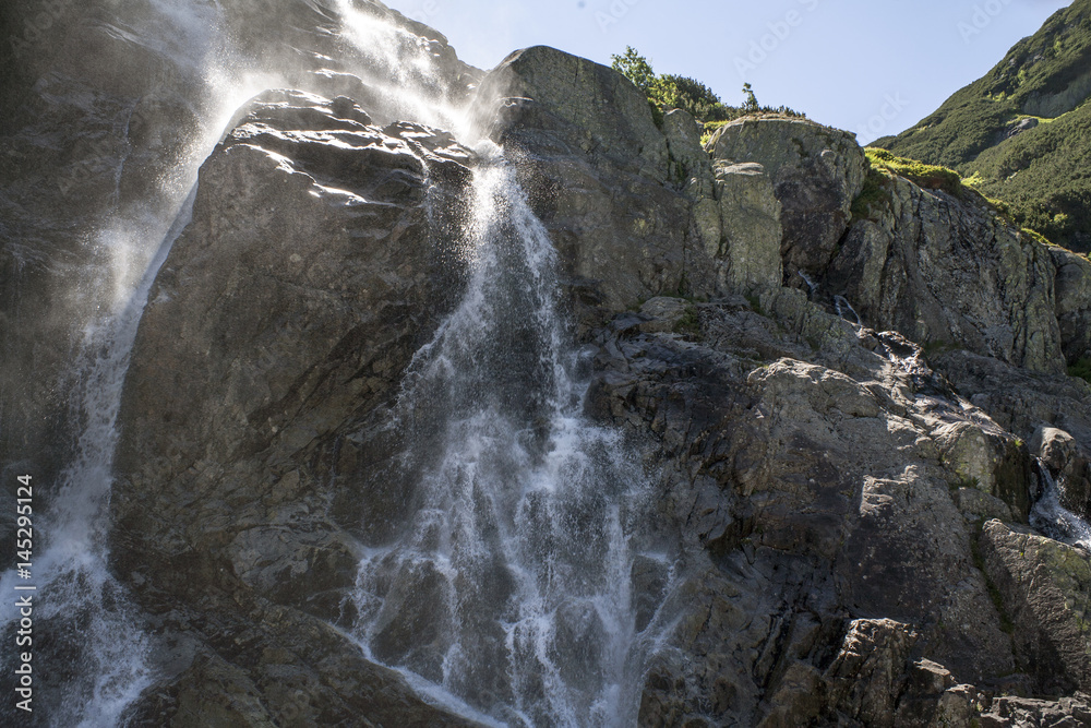 Polish mountains valley of five lakes. National Park in Zakopane. Great Waterfall Waterfall